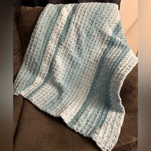 handcrafted blanket measures 47 inches by 36 inches